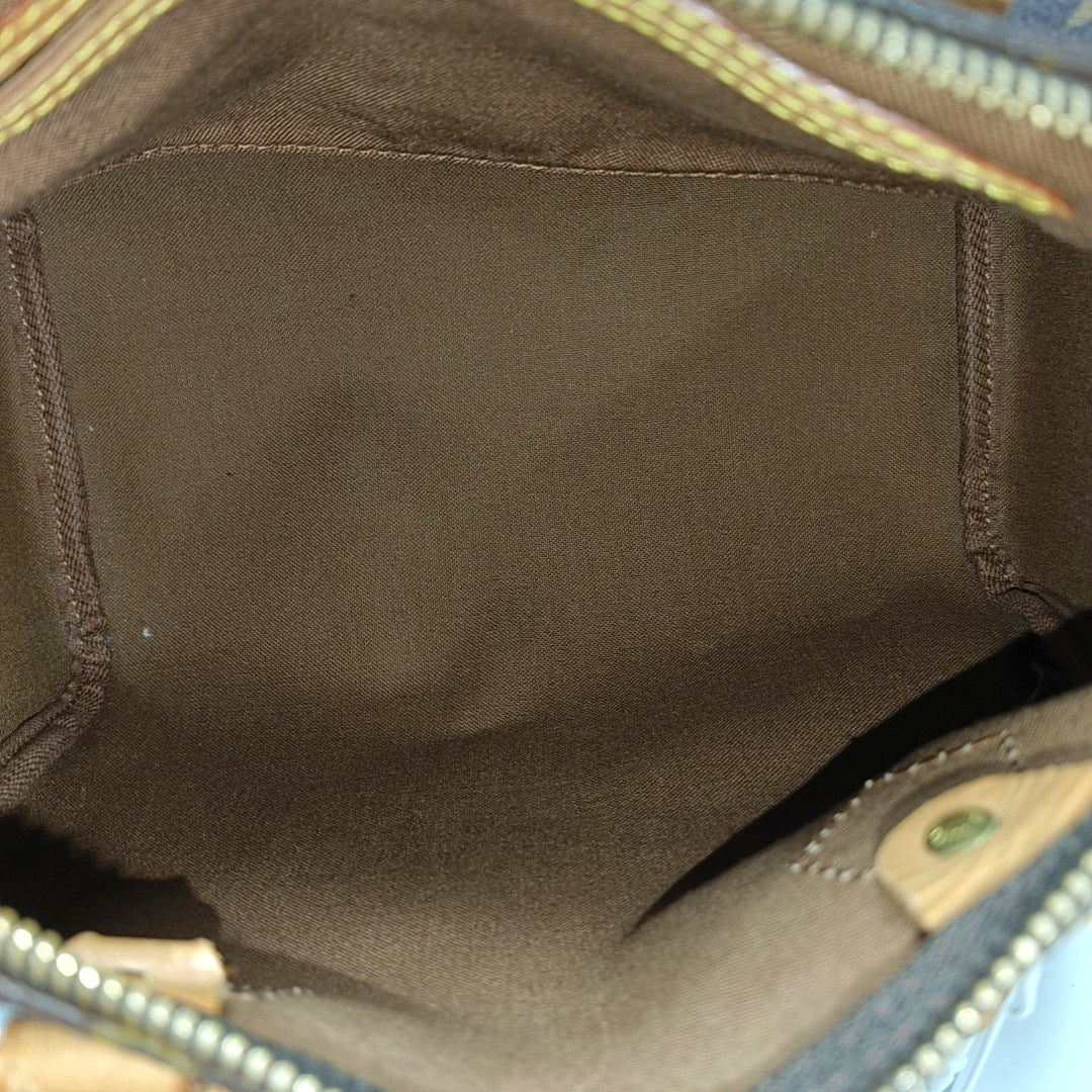SPEEDY 25 Monogram Coated Canvas Brown