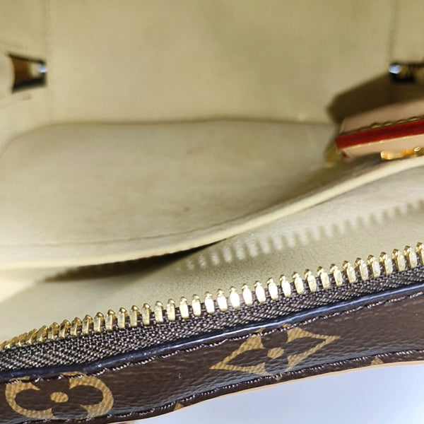 LUGGAGE Monogram Coated Canvas Brown