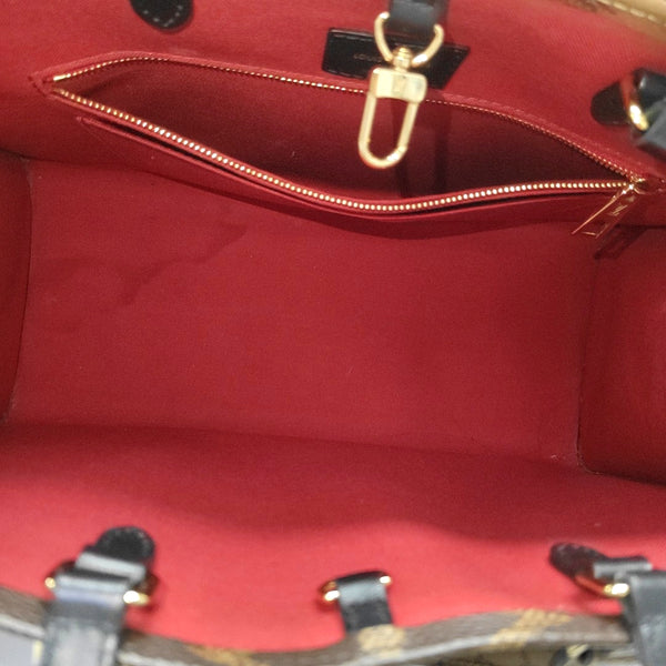 ONTHEGO MM Monogram Coated Canvas Brown