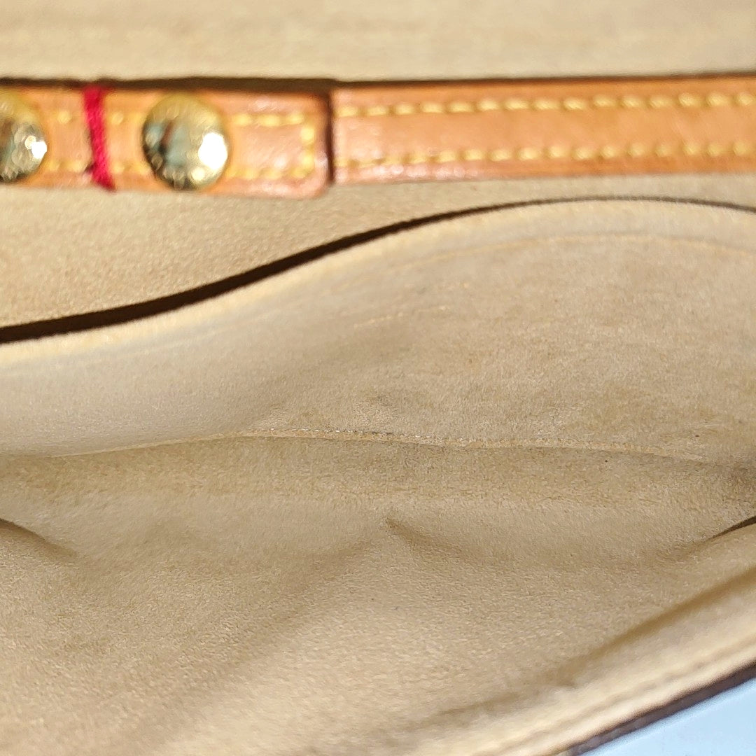 TWIN GM Monogram Coated Canvas Brown