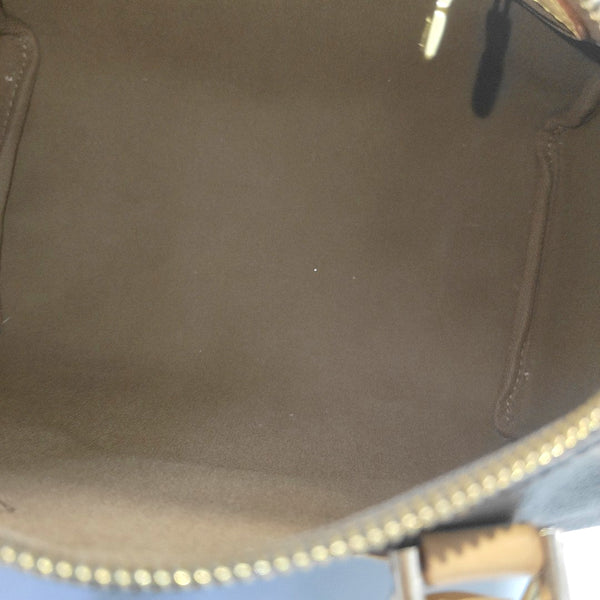 SPEEDY 25 Monogram Coated Canvas Brown