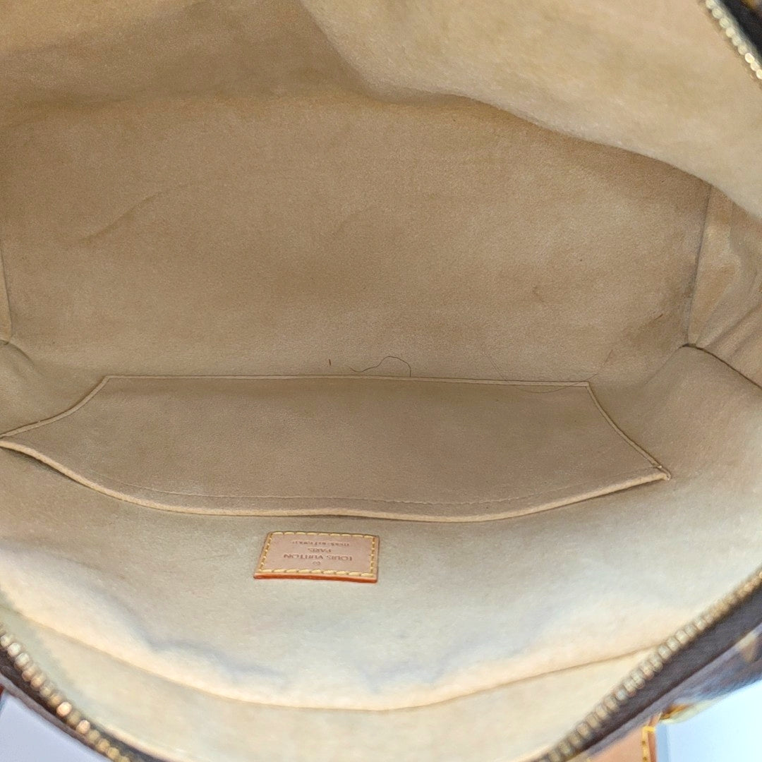 MANHATTAN GM Monogram Coated Canvas Brown