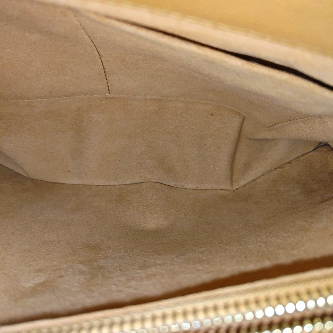 VÉNUS Monogram Coated Canvas Brown
