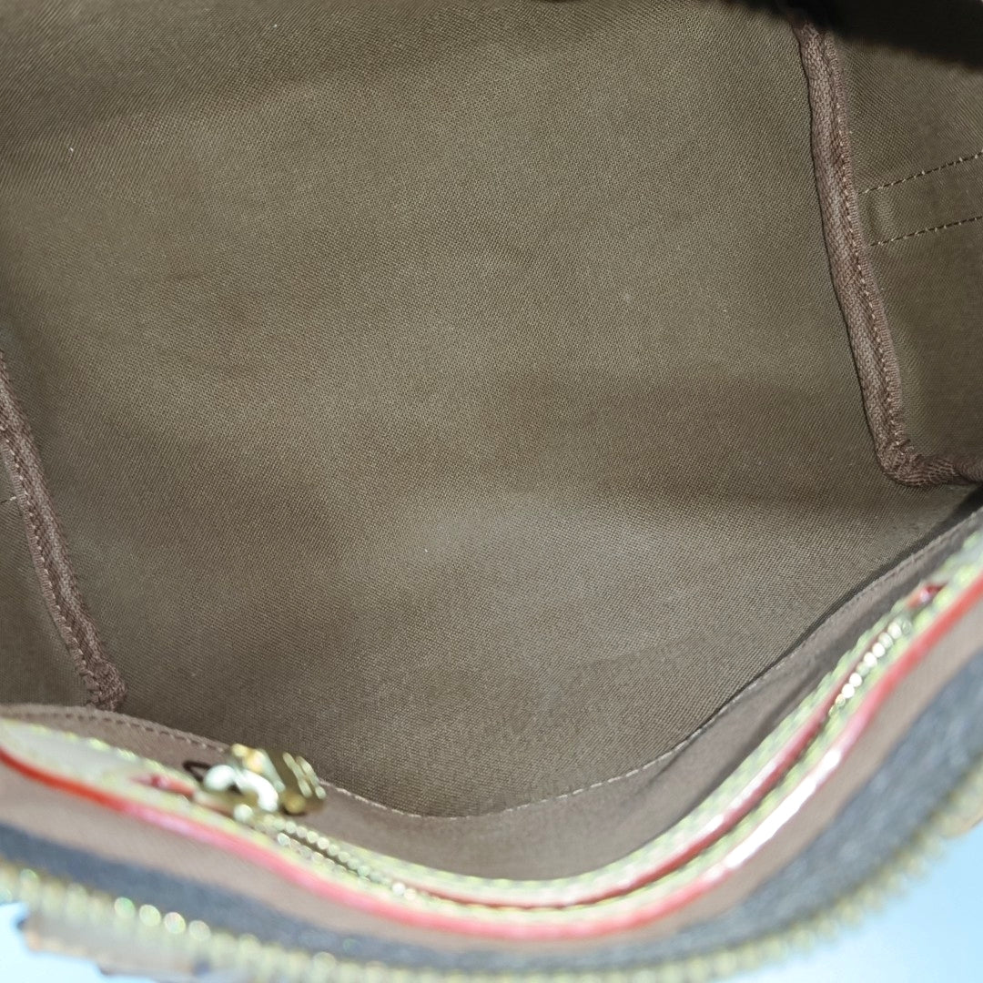 SPEEDY 25 Monogram Coated Canvas Brown
