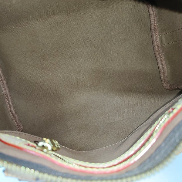 SPEEDY 25 Monogram Coated Canvas Brown