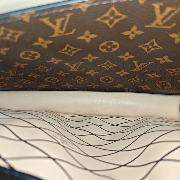 TRUNK Monogram Coated Canvas Brown