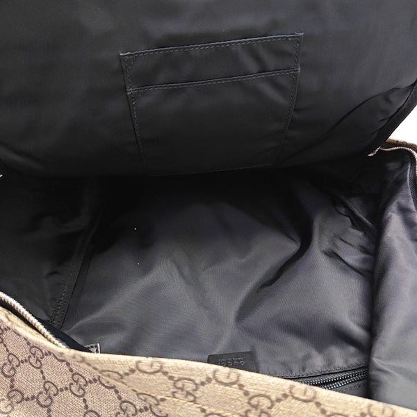 Monogram Coated Canvas Backpack Brown
