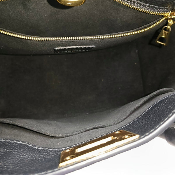 ON MY SIDE PM Monogram Coated Canvas Black