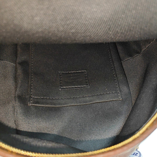 Authenticated pre-owned  PALM SPRINGS Mini Monogram Coated Canvas Brown - Backpack at Looply