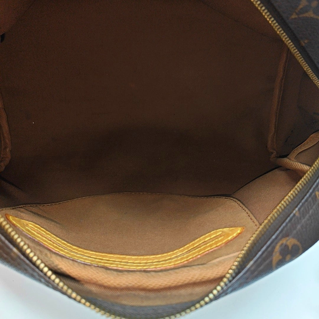 MONTORGUEI PM Monogram Coated Canvas Brown