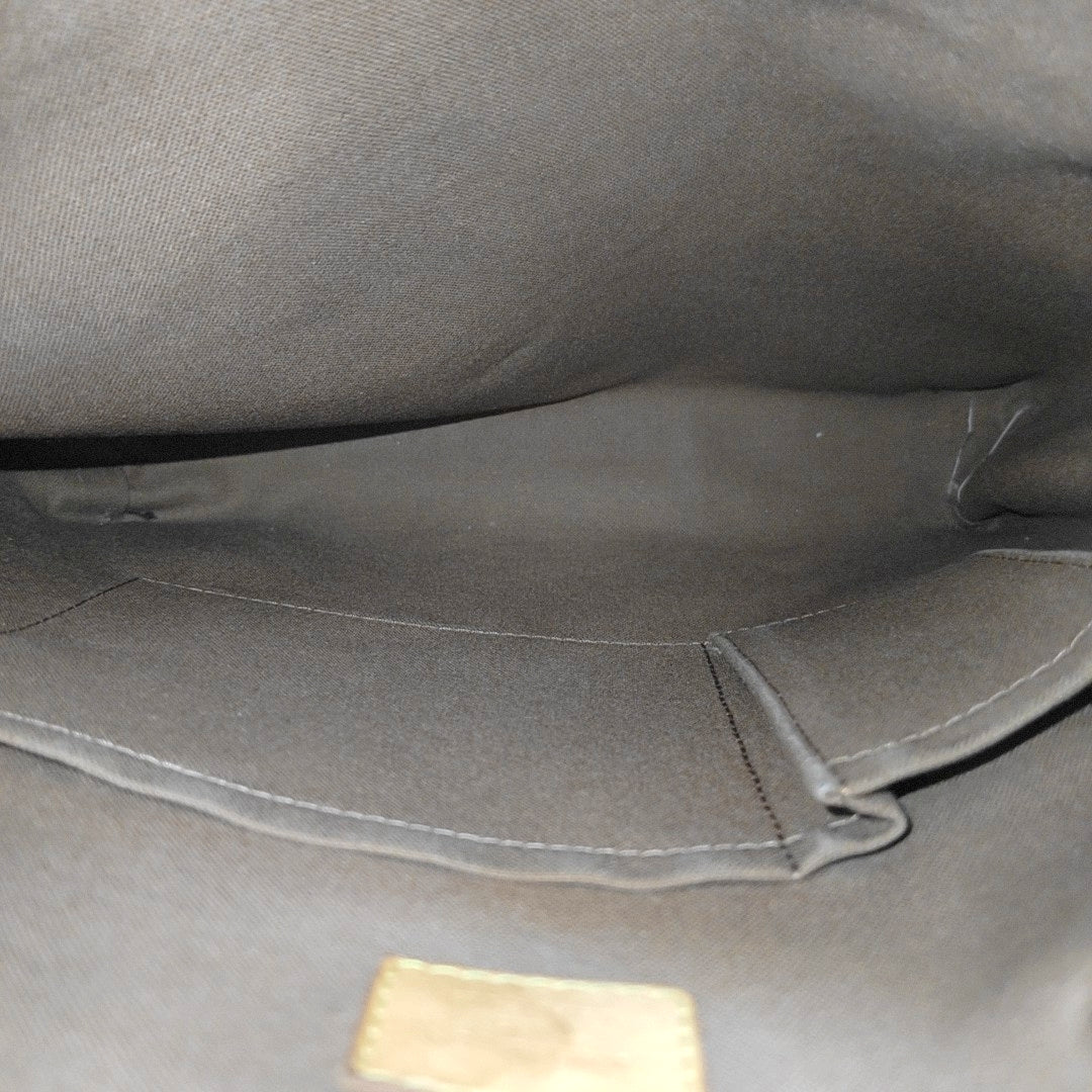 ODEON Monogram Coated Canvas Brown