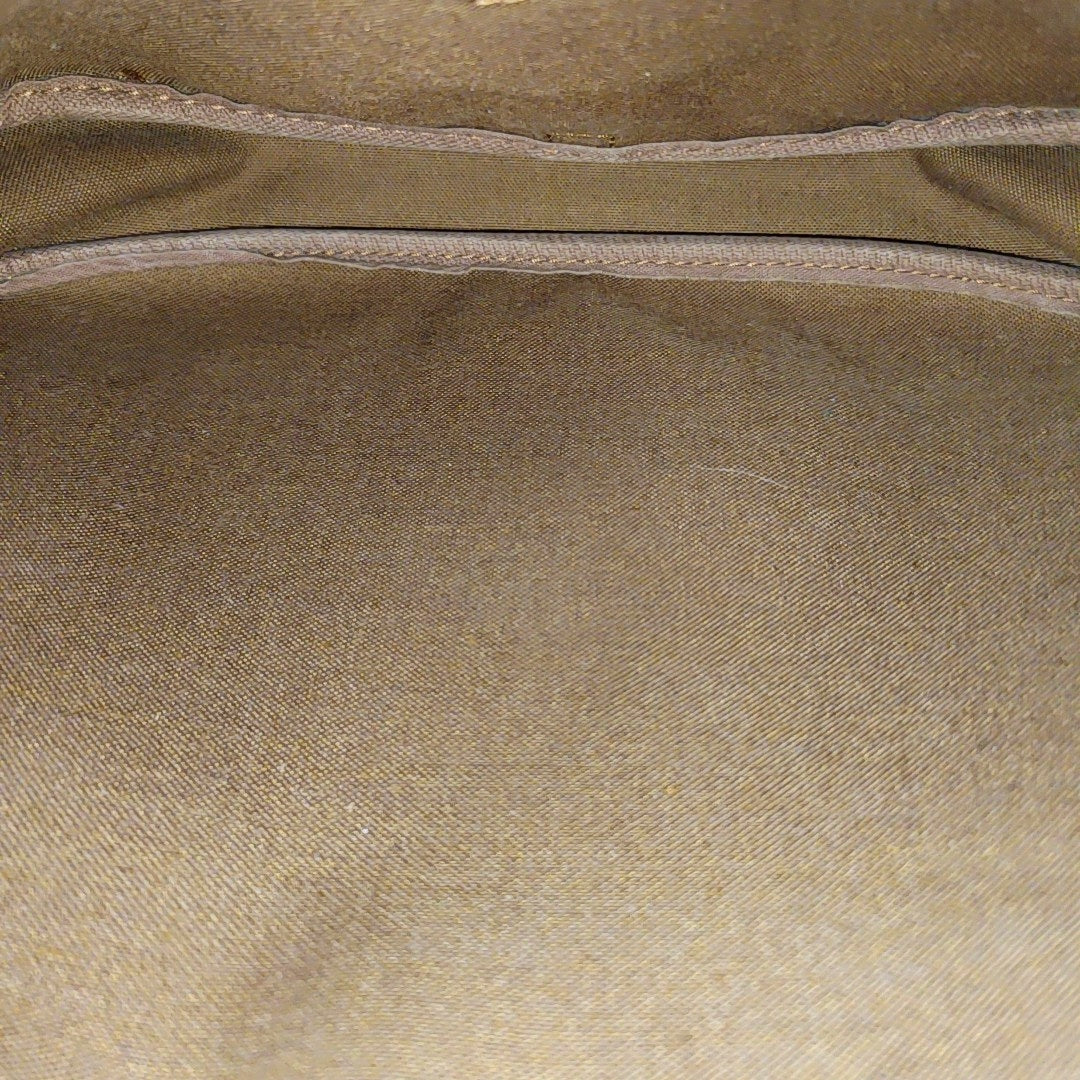 SAUMUR 35 Monogram Coated Canvas Brown