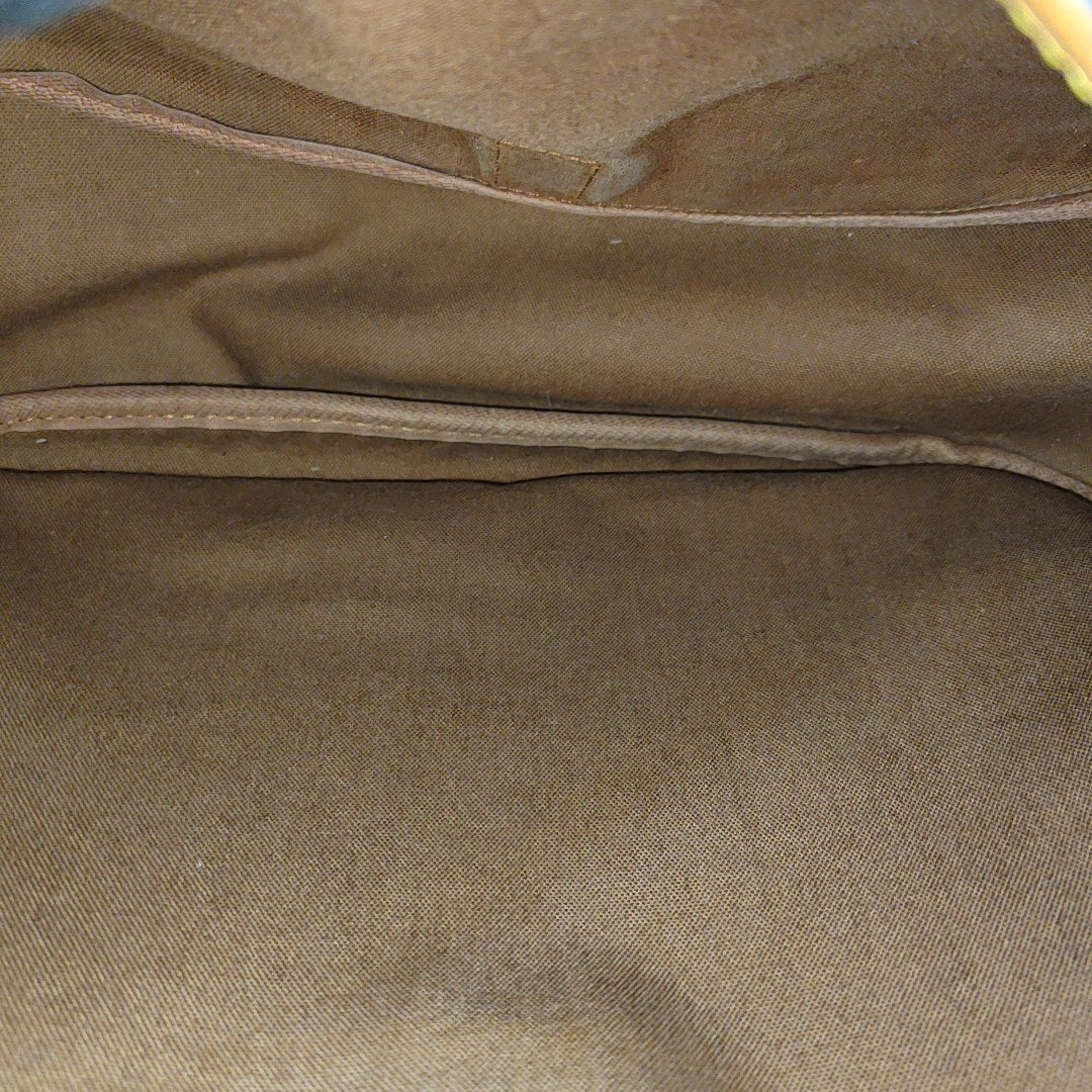 SAUMUR Monogram Coated Canvas Brown