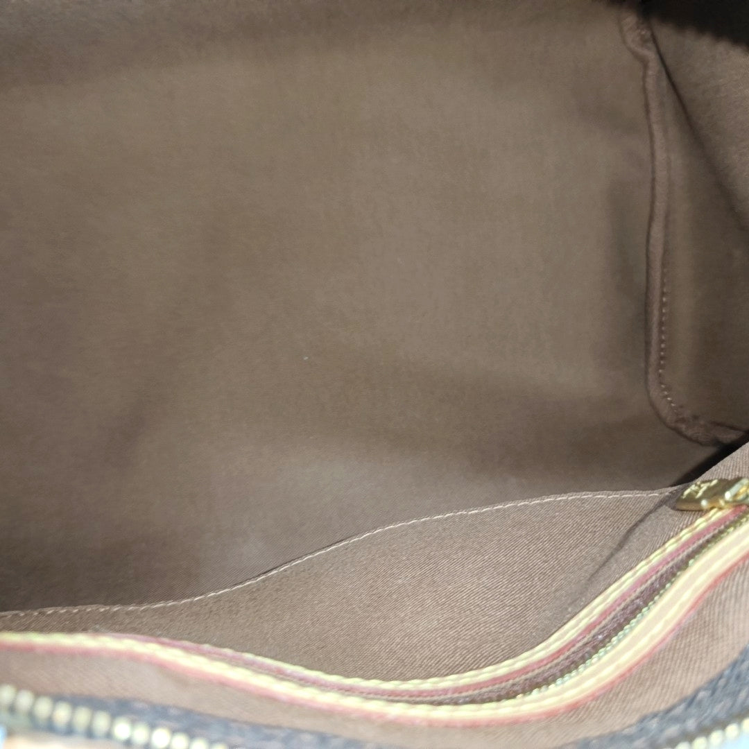 SPEEDY 30 Monogram Coated Canvas Brown