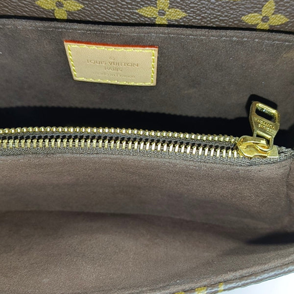MÉTIS EAST WEST Monogram Coated Canvas Brown