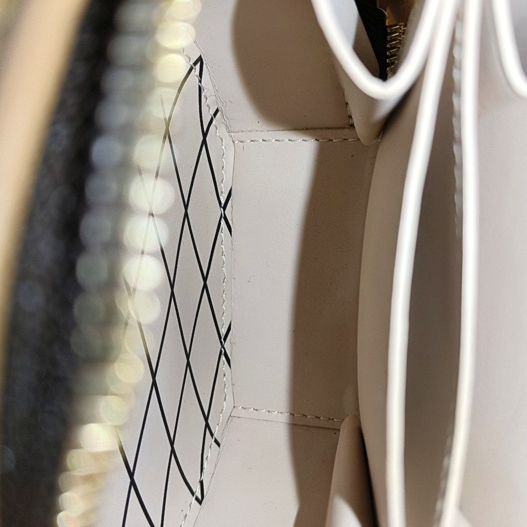 BOITE CHAPEAU Mini Monogram Coated Canvas Brown