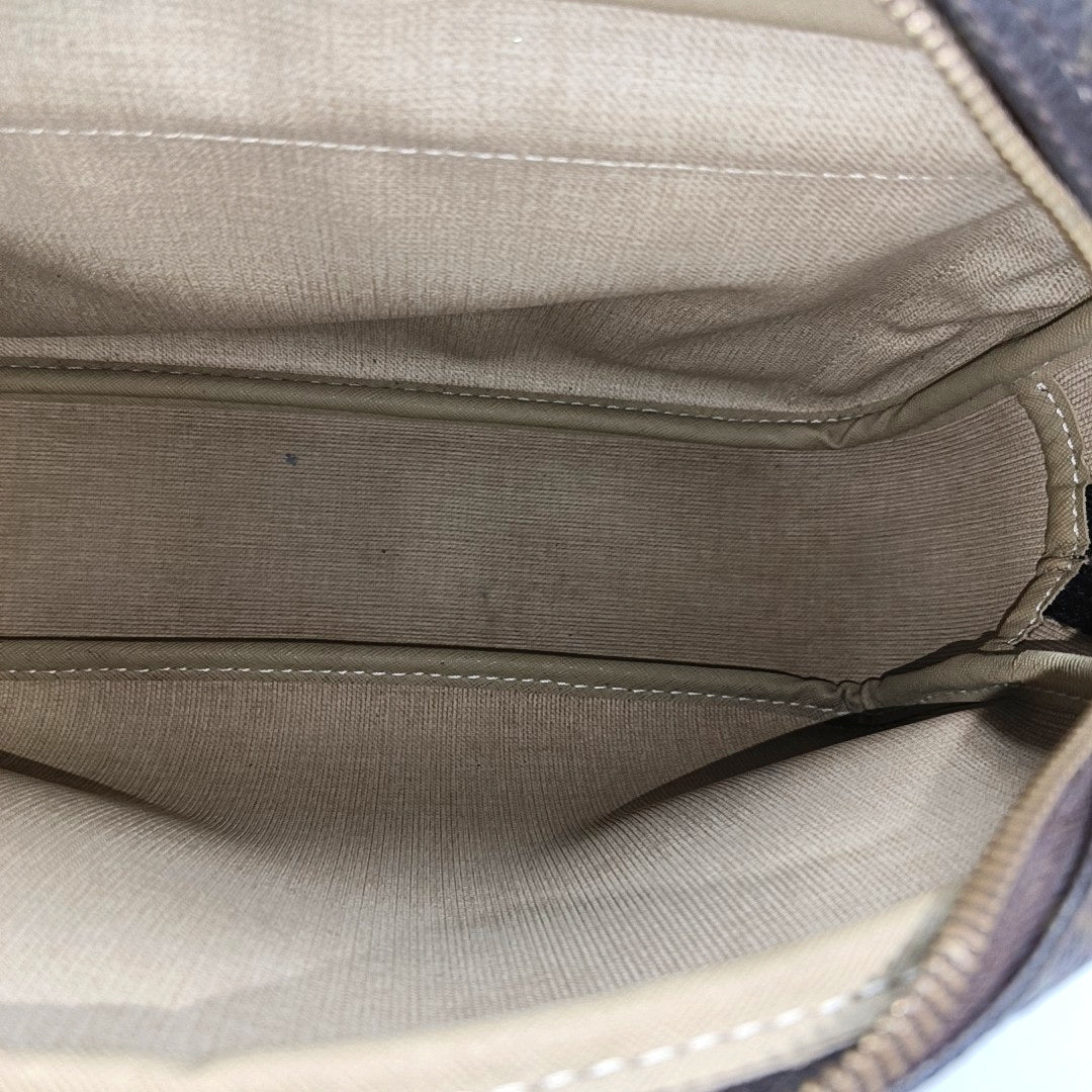 REPORTER Monogram Coated Canvas Brown