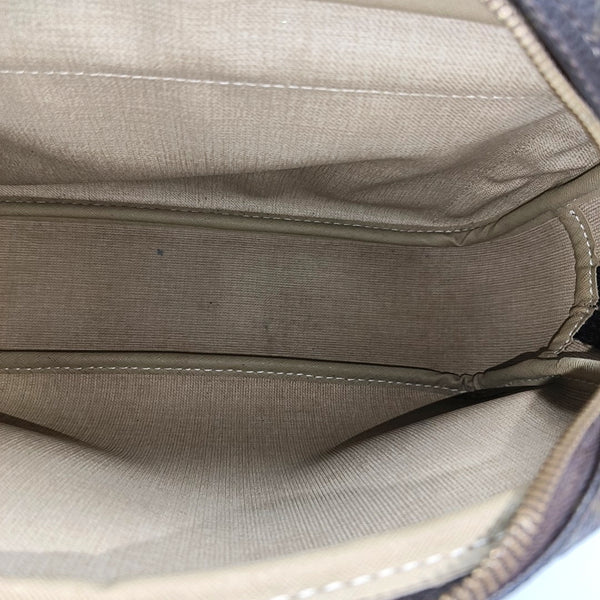 REPORTER Monogram Coated Canvas Brown