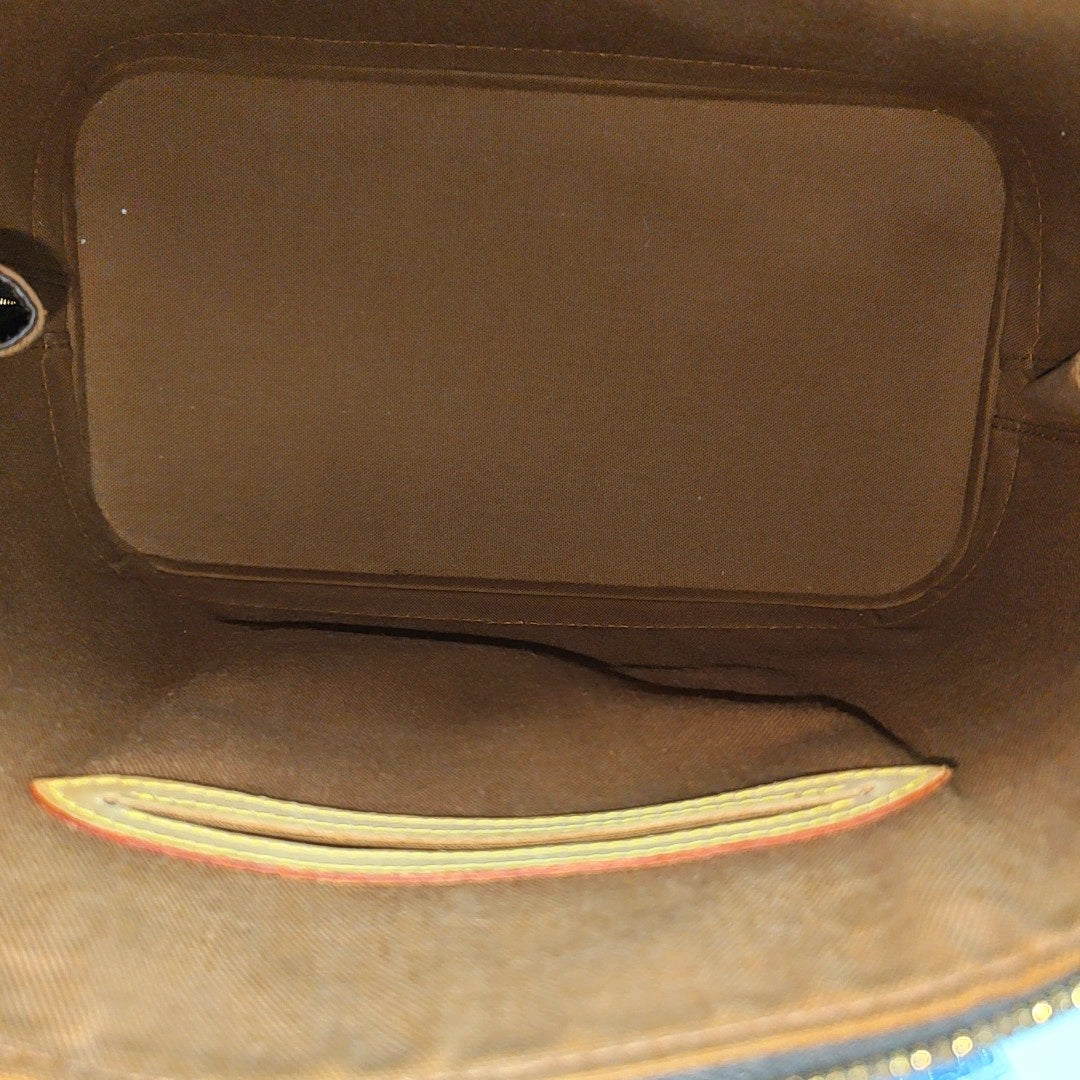 ALMA PM Monogram Coated Canvas Brown