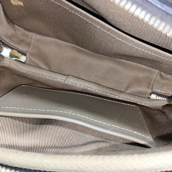 UTILITY Monogram Coated Canvas Brown