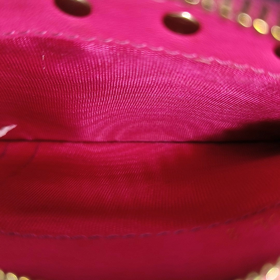 Authenticated pre-owned  Rockstud Calfskin Pink - Clutch at Looply