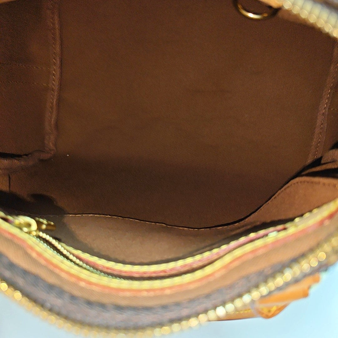 SPEEDY 25 Monogram Coated Canvas Brown