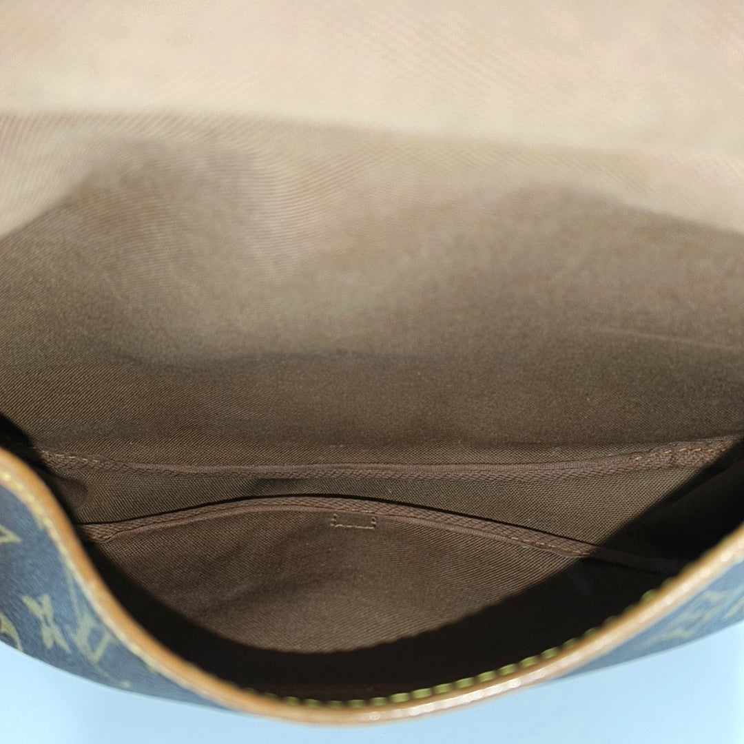 SAUMUR Monogram Coated Canvas Brown