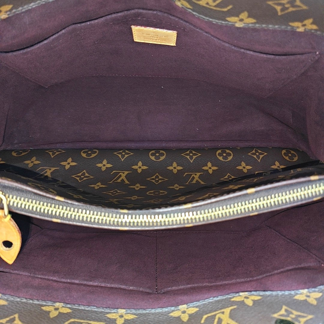 MONTAIGNE GM Monogram Coated Canvas Brown