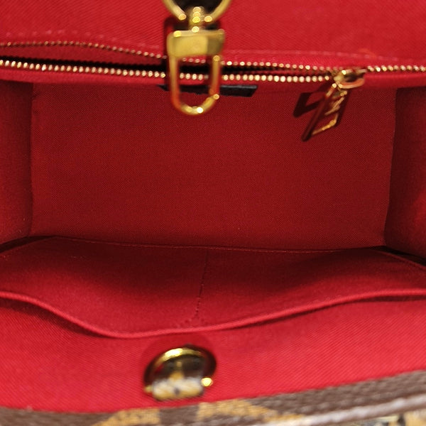 ONTHEGO PM Monogram Coated Canvas Brown