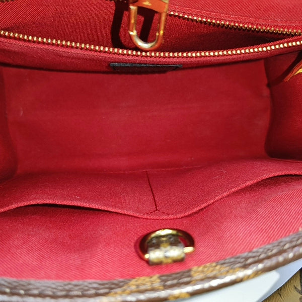 ONTHEGO PM Monogram Coated Canvas Brown