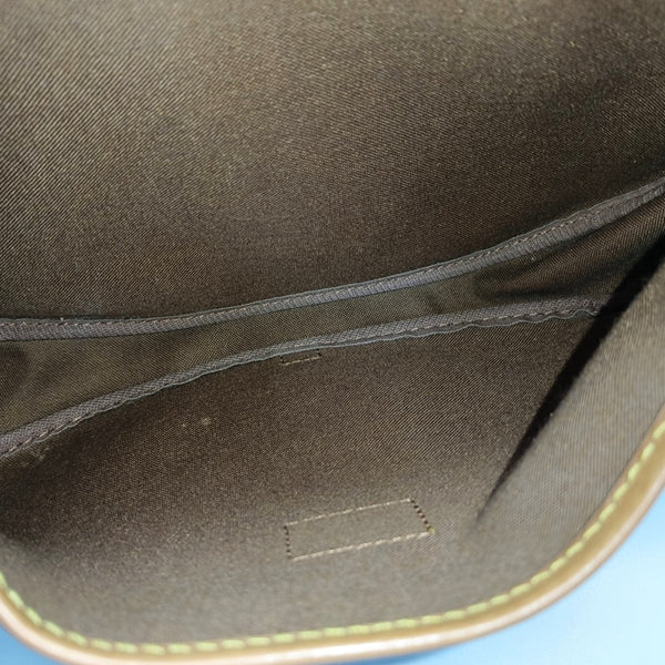 SAUMUR Monogram Coated Canvas Brown