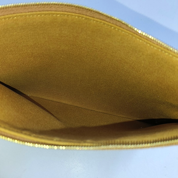 Authenticated pre-owned  TRIOMPHE Small Coated Canvas Brown - Clutch at Looply