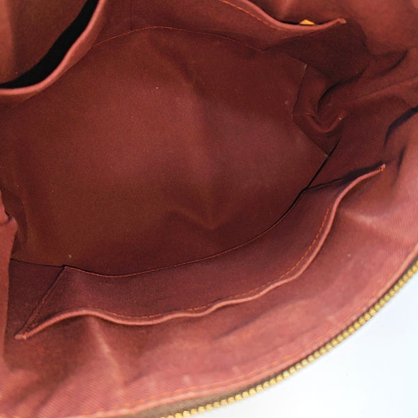 RIVOLI MM Monogram Coated Canvas Brown