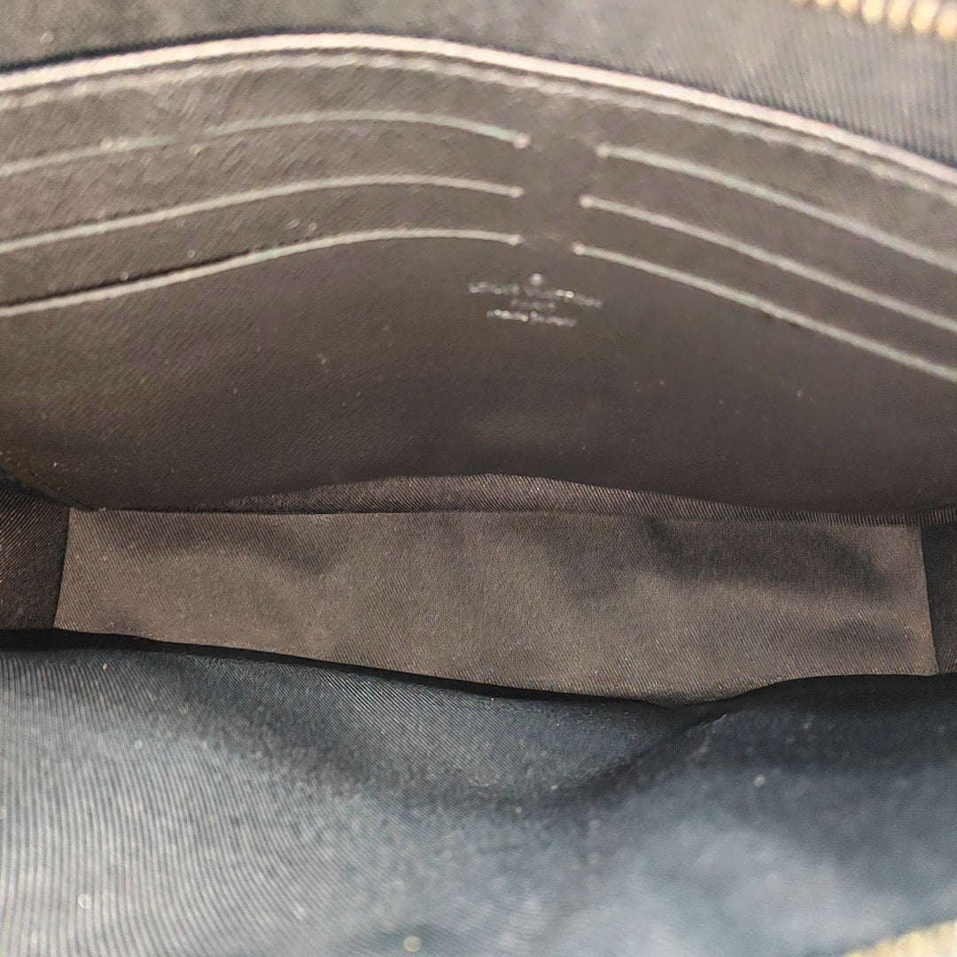 Pochette Voyag MM Monogram Coated Canvas Gray