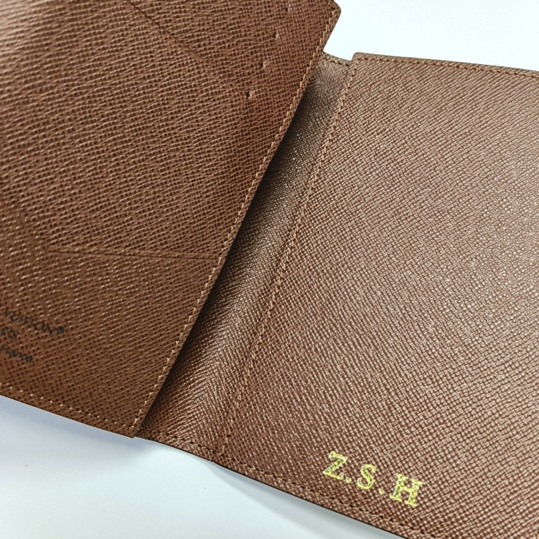 Monogram Coated Canvas Wallet Brown