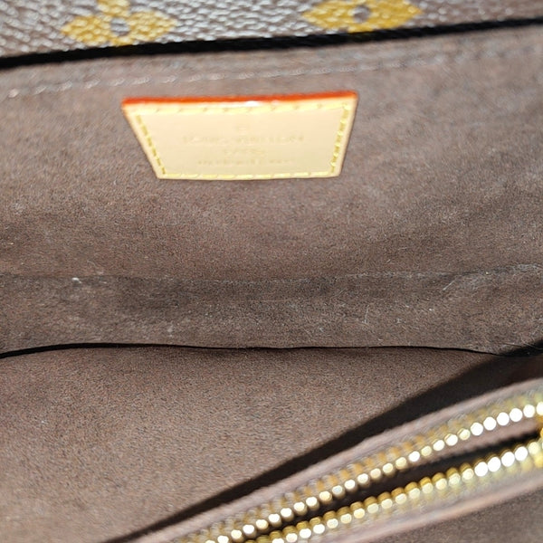 MÉTIS EAST WEST Monogram Coated Canvas Brown