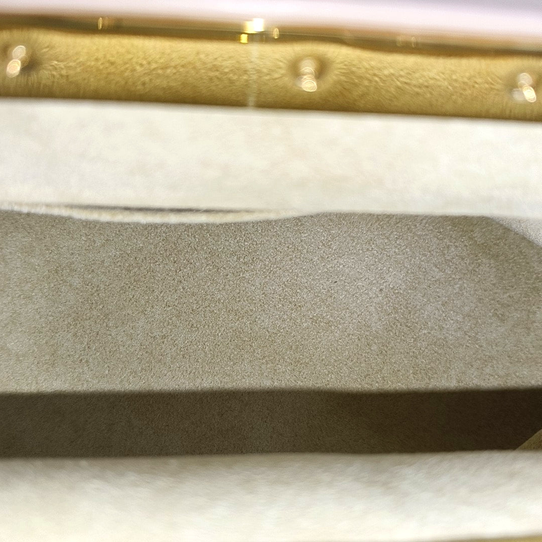 CLUTCH Monogram Coated Canvas Brown