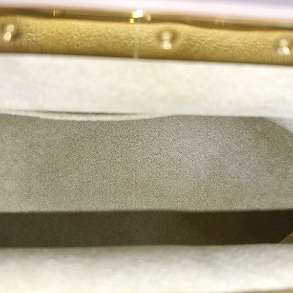 CLUTCH Monogram Coated Canvas Brown
