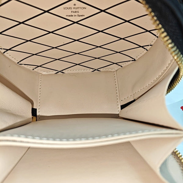 BOITE CHAPEAU Mini Monogram Coated Canvas Brown