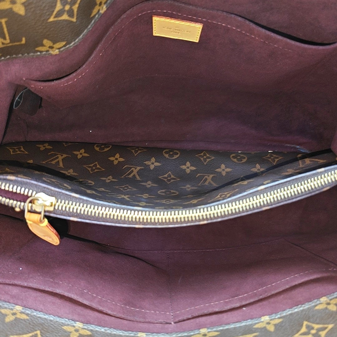 MONTAIGNE GM Monogram Coated Canvas Brown