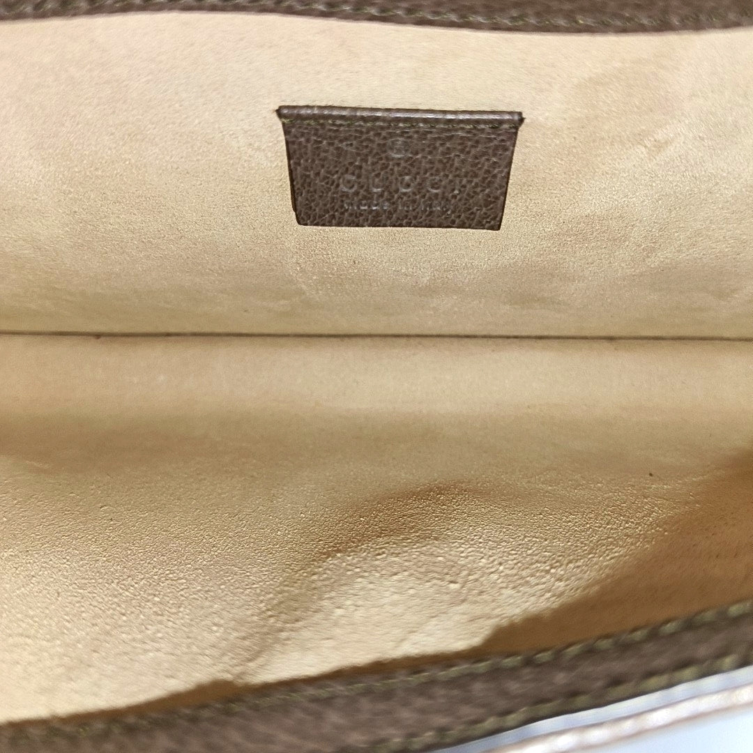 Monogram Coated Canvas Clutch Beige
