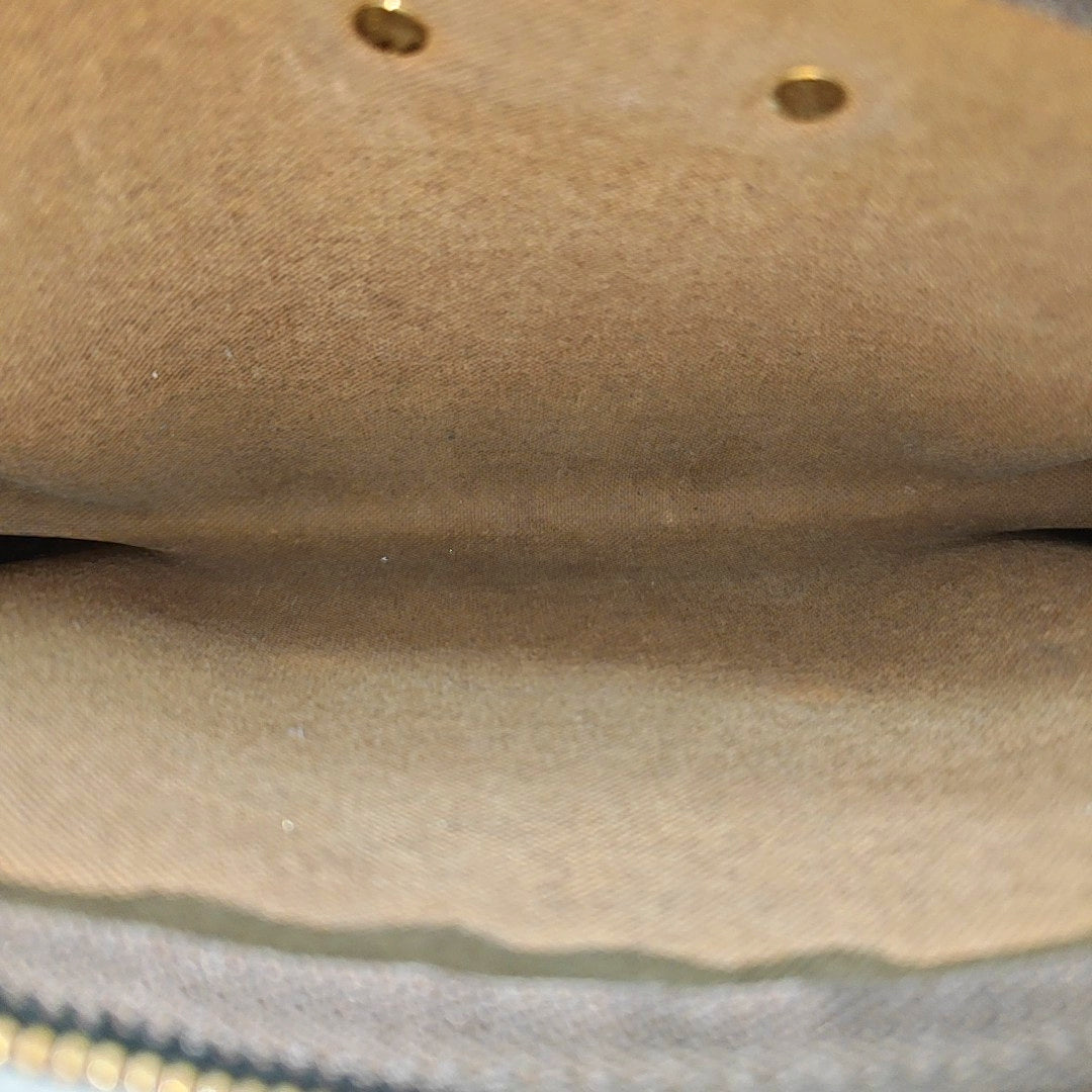 EVA Monogram Coated Canvas Brown