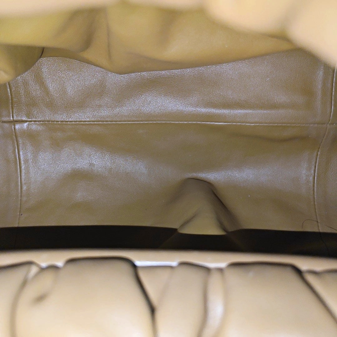 Authenticated pre-owned  The Pouch Calfskin Brown - Top Handle Bag at Looply