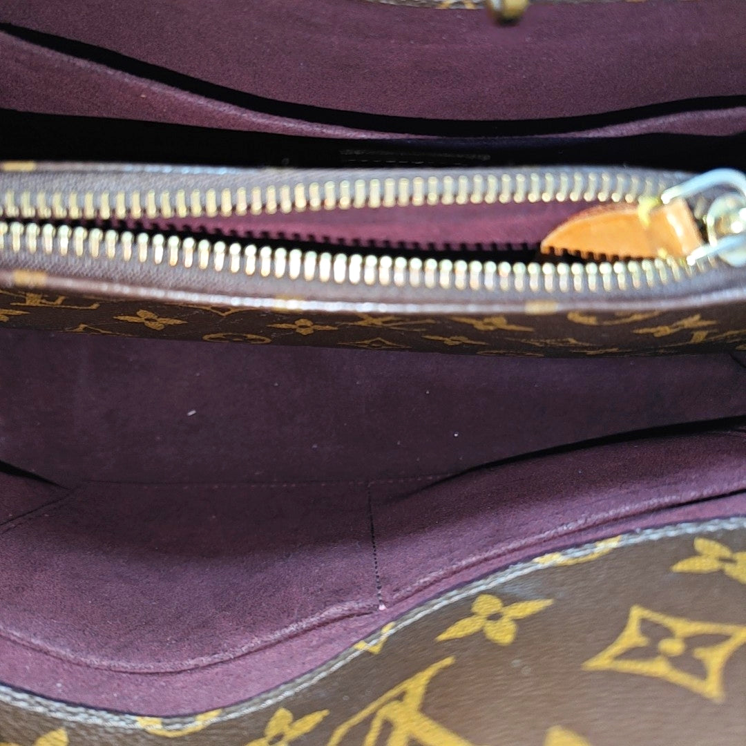 MONTAIGNE GM Monogram Coated Canvas Brown