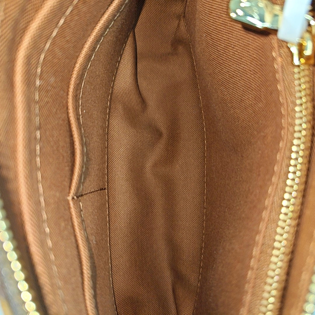 POCHETTE ACCESSOIRES GM Monogram Coated Canvas Brown