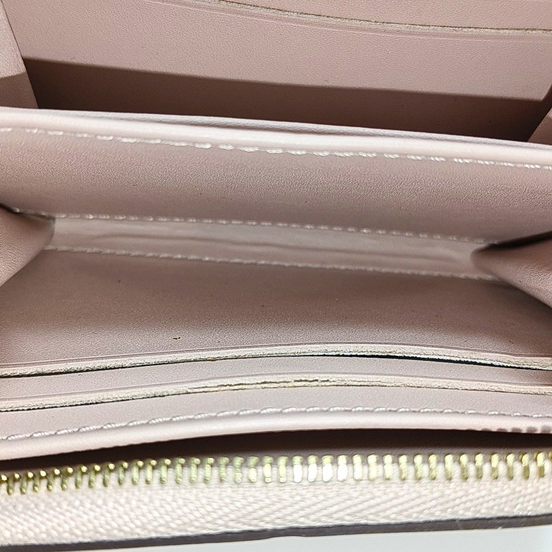 ZIPPY Monogram Patent Leather Yellow Wallet