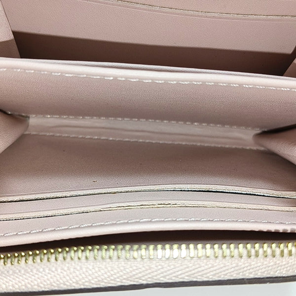 ZIPPY Monogram Patent Leather Yellow Wallet