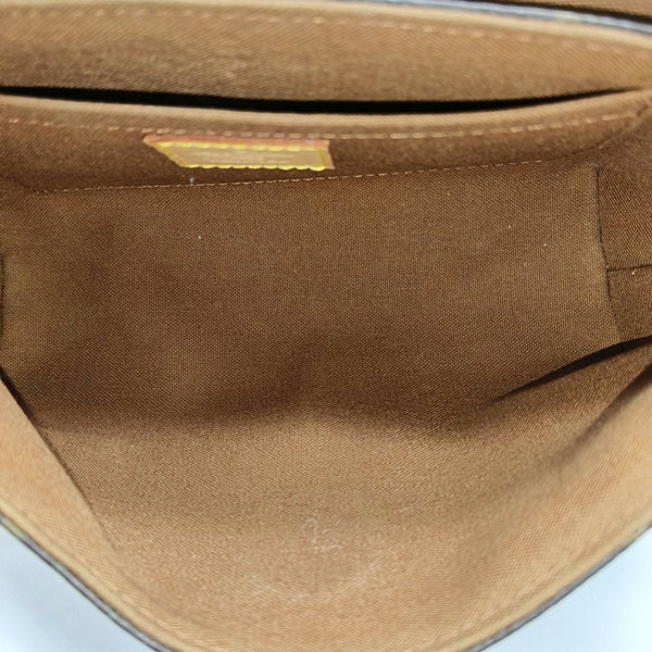 TIKAL Monogram Coated Canvas Brown