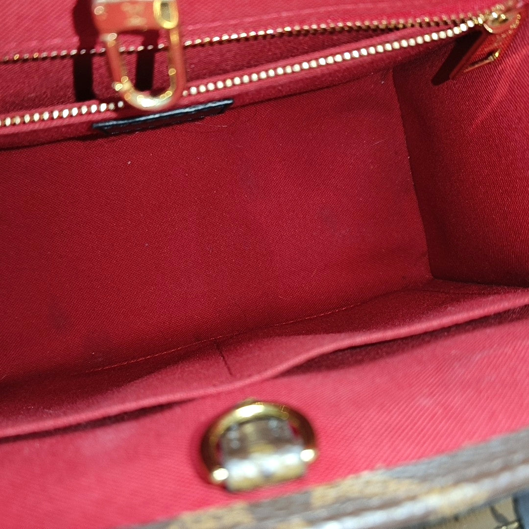 ONTHEGO PM Monogram Coated Canvas Brown