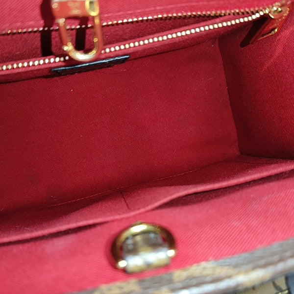 ONTHEGO PM Monogram Coated Canvas Brown